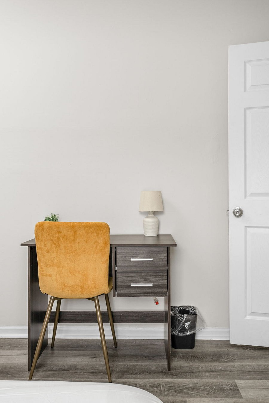 Minimalist workspace with a cozy touch, perfect for productivity.