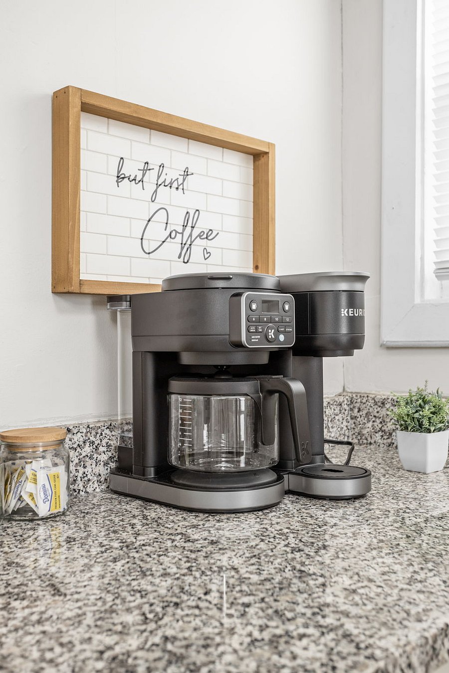 Start your day right with a fresh cup of coffee from this sleek Keurig machine!