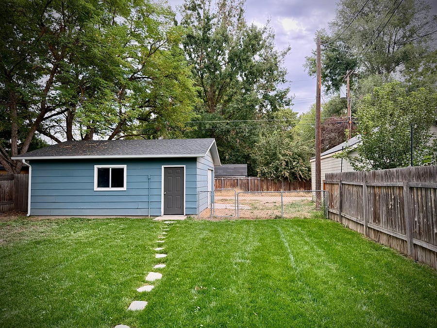 Detached 1 car garage plus parking.