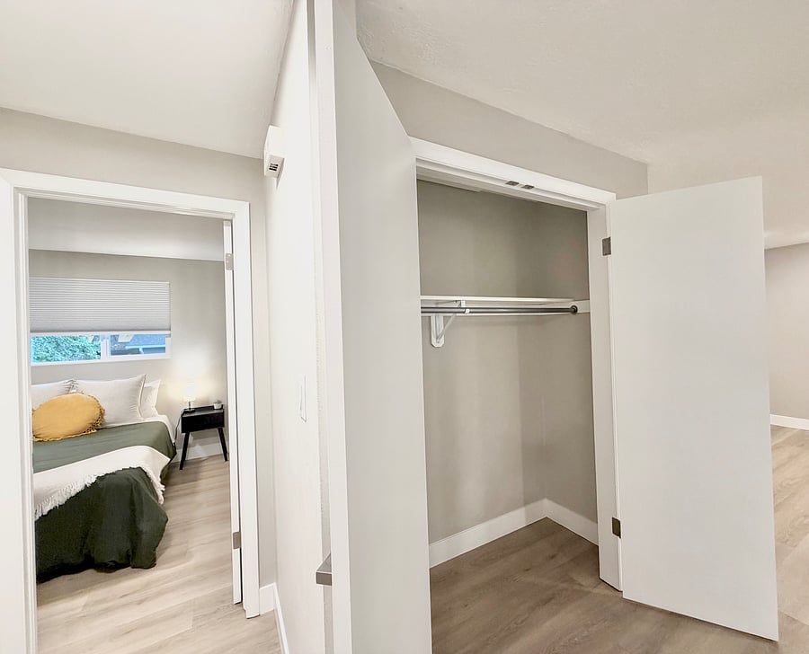 Hall closet between the living room bedrooms and upstairs bathroom.