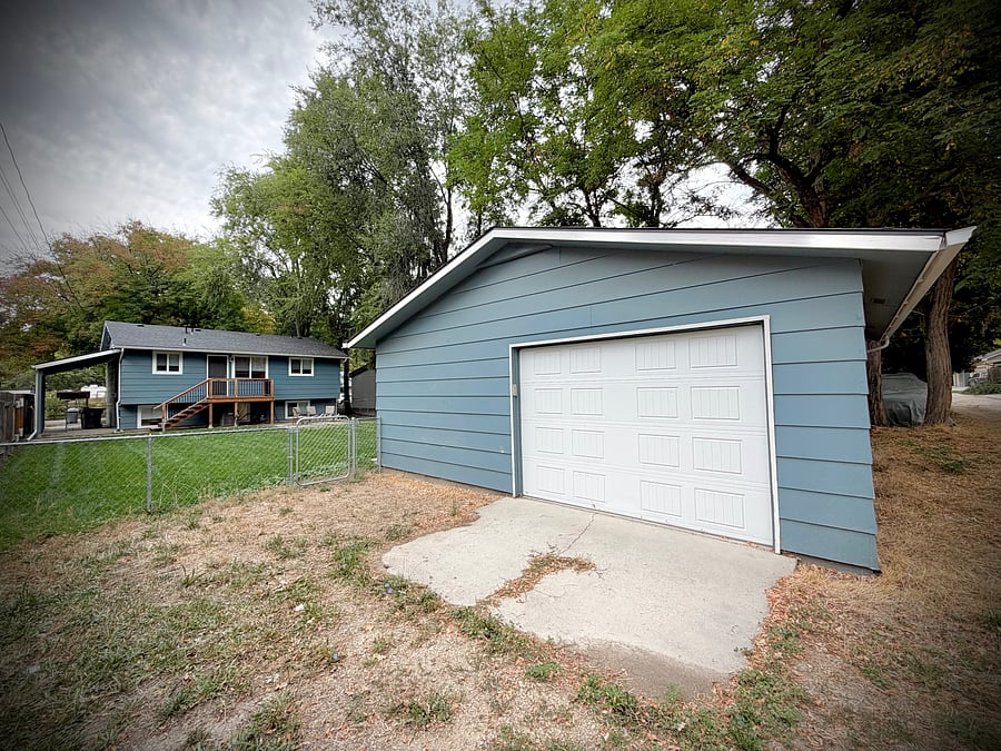 1 car garage, alley parking, fully fenced backyard, back of house.
