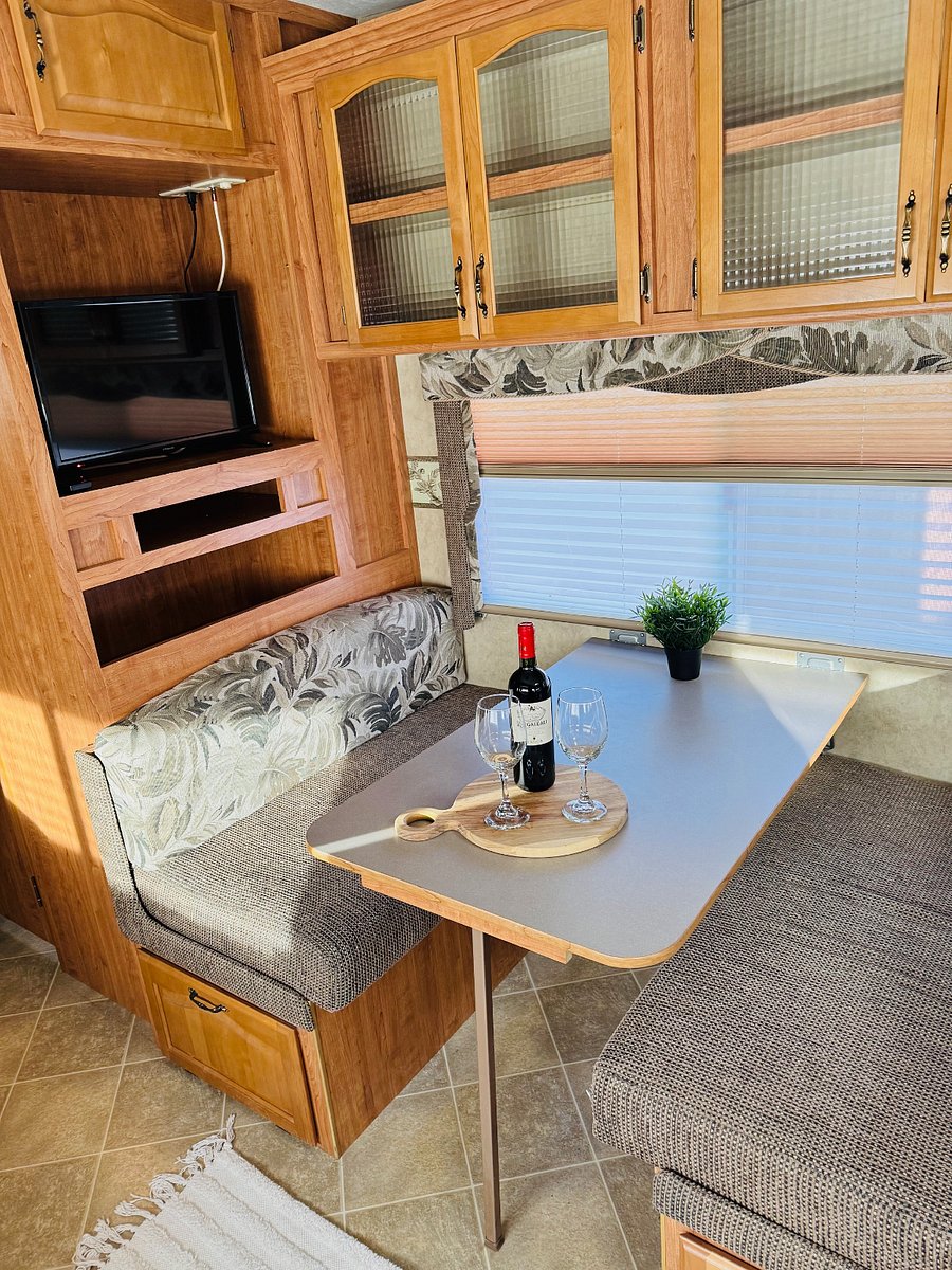 Well lit dining table or work space with TV