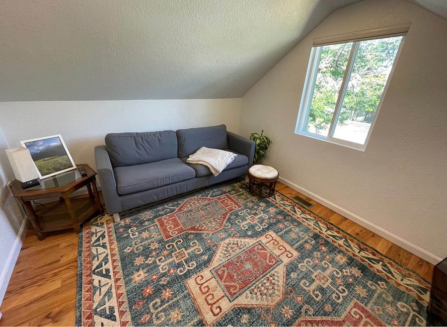 extra room in loft, window faces west.
