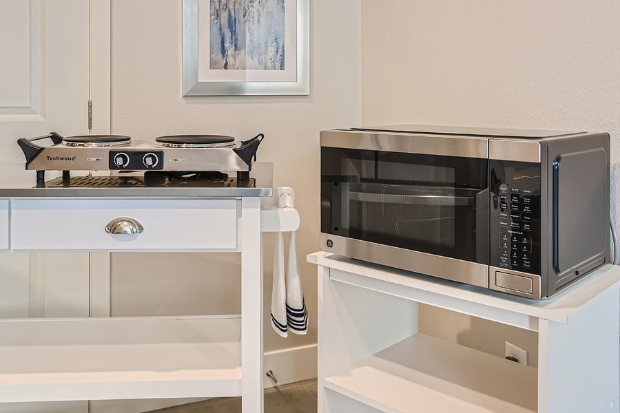 Double-burner cooktop and convection microwave. NOT PICTURED is the Gourmia XL Digital Countertop Oven