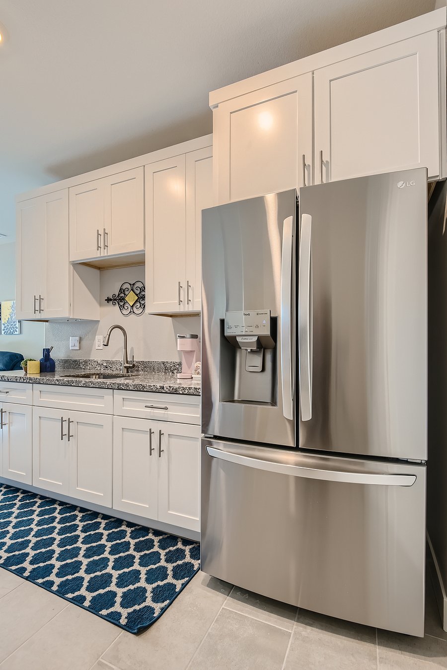 Deluxe, Full-size refrigerator with dual icemaker and filtered water.