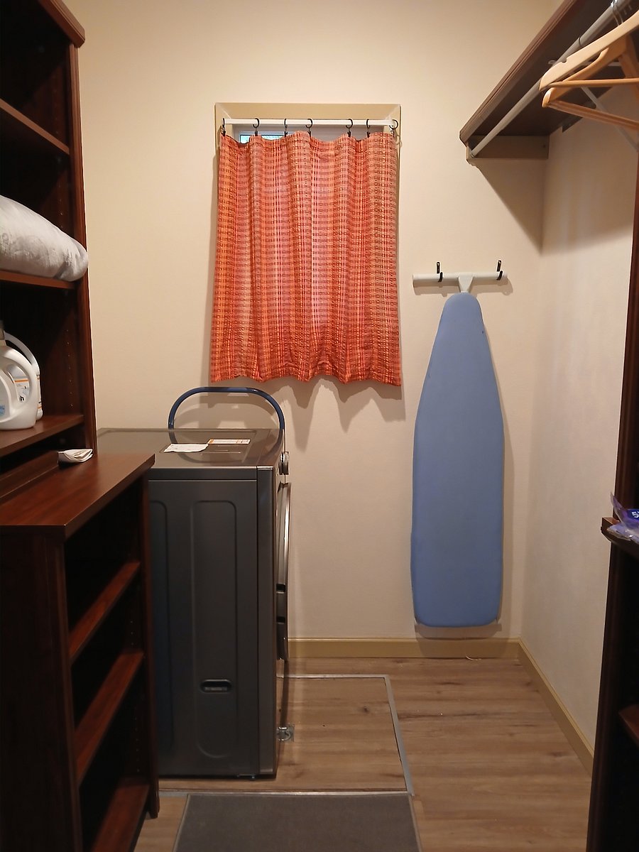 Huge walk in closet with a brand new LG combo washer/dryer.