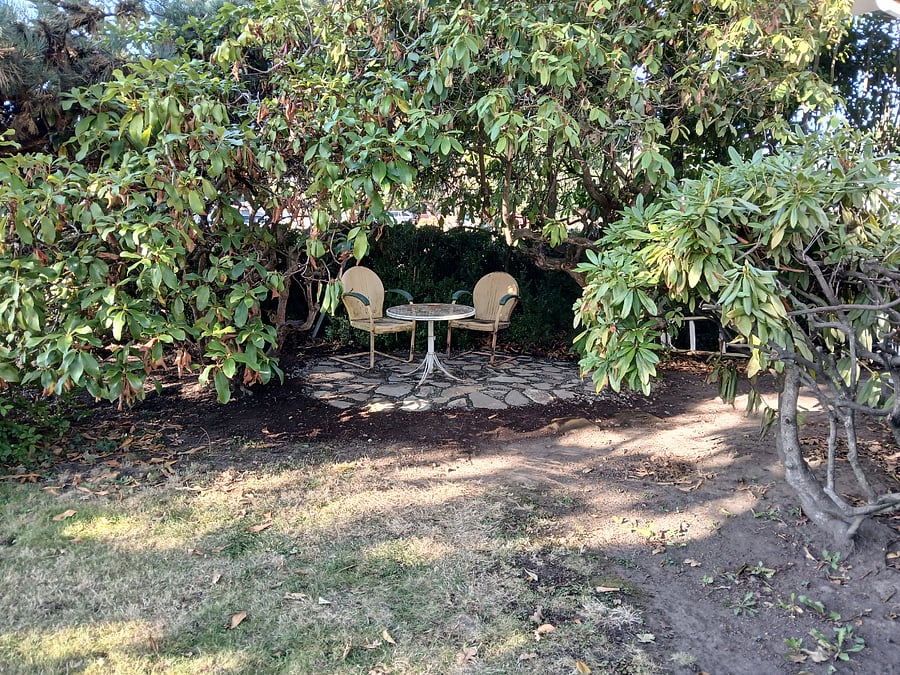 Front yard secluded sitting area.