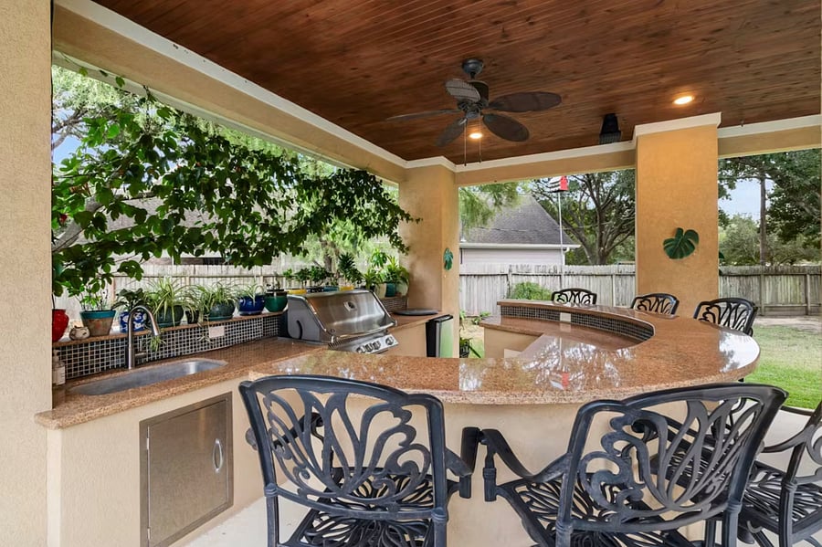 Share barbecue area. Outdoor natural gas grill, sink, and refrigerator perfect for cooking and relaxing outdoors