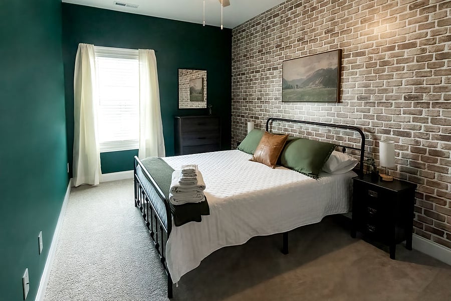 Queen room which memory foam mattress, full size closet, and luggage rack.