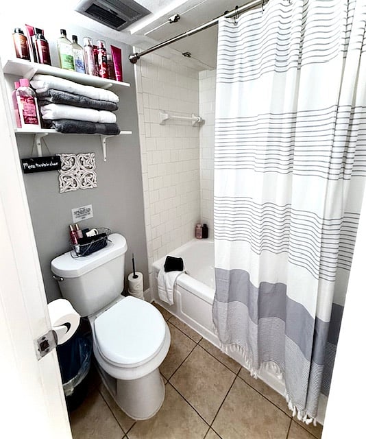 Cozy bathroom area stocked with Bath & Body Works soaps, lotions, sprays, and soft towels. The bath tub is super clean and deep to keep you in hot baths to relax.