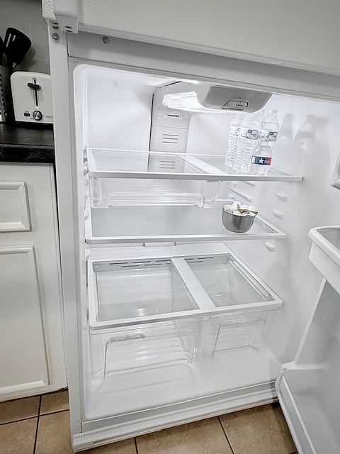 Large refrigerator with a filtered ice maker.