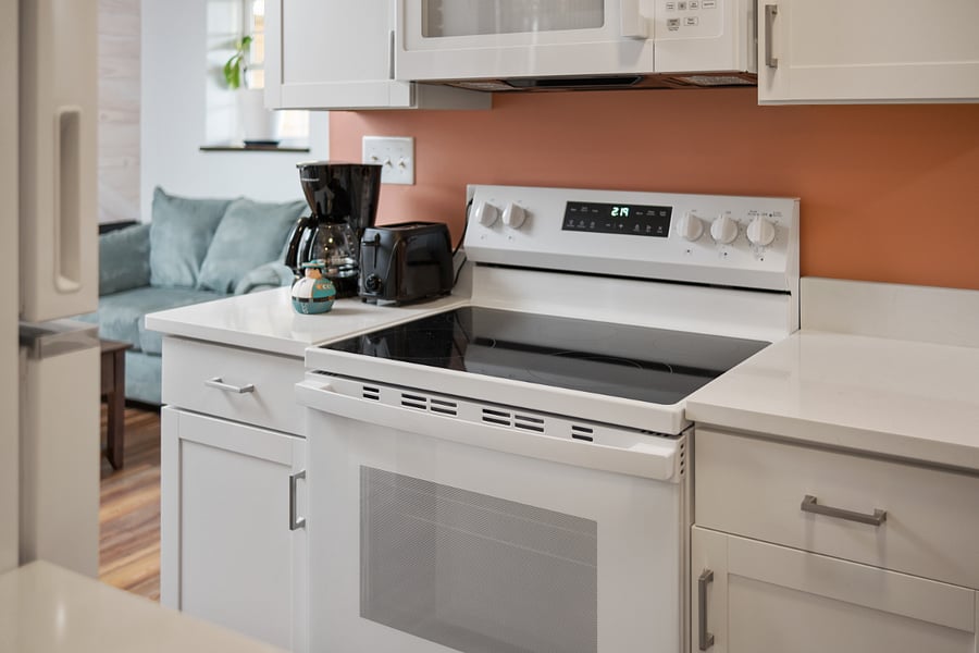 Electric stove, microwave, coffee pot, toaster