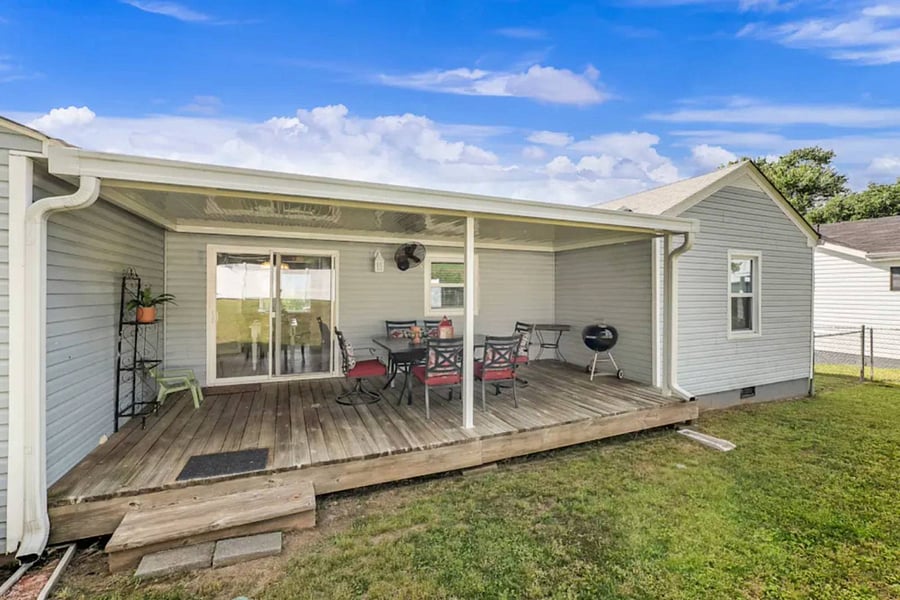 Covered back porch, perfect for grilling and enjoying meals outdoors