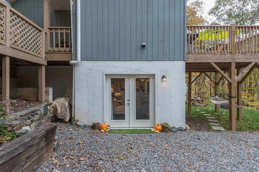 The base floor shown here is a separate rental space that may also be rented if available- 1 bedroom, bath suite with a kitchenette & den. (It is completely private from the above main house.)