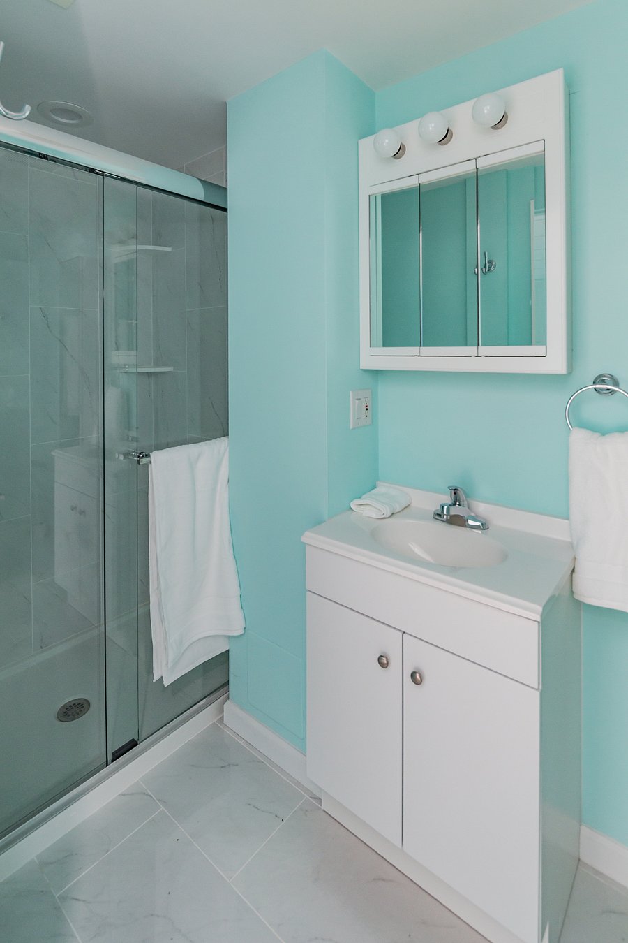 Sink in bathroom with shower
