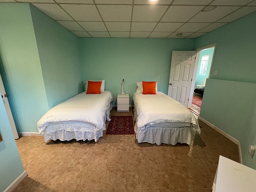Seond bedroom with two twin XL beds atht can combine to a king bed
