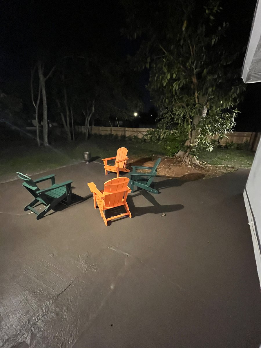 Shared outside chat/ chill out area on side patio by laundry room.