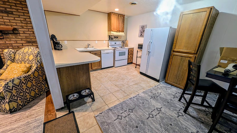 Large kitchen with microwave, dishwasher, coffee maker and more