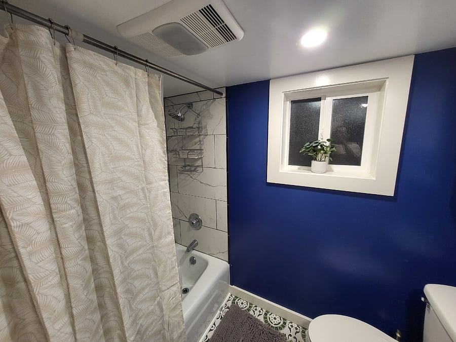 Full bathroom with tub.