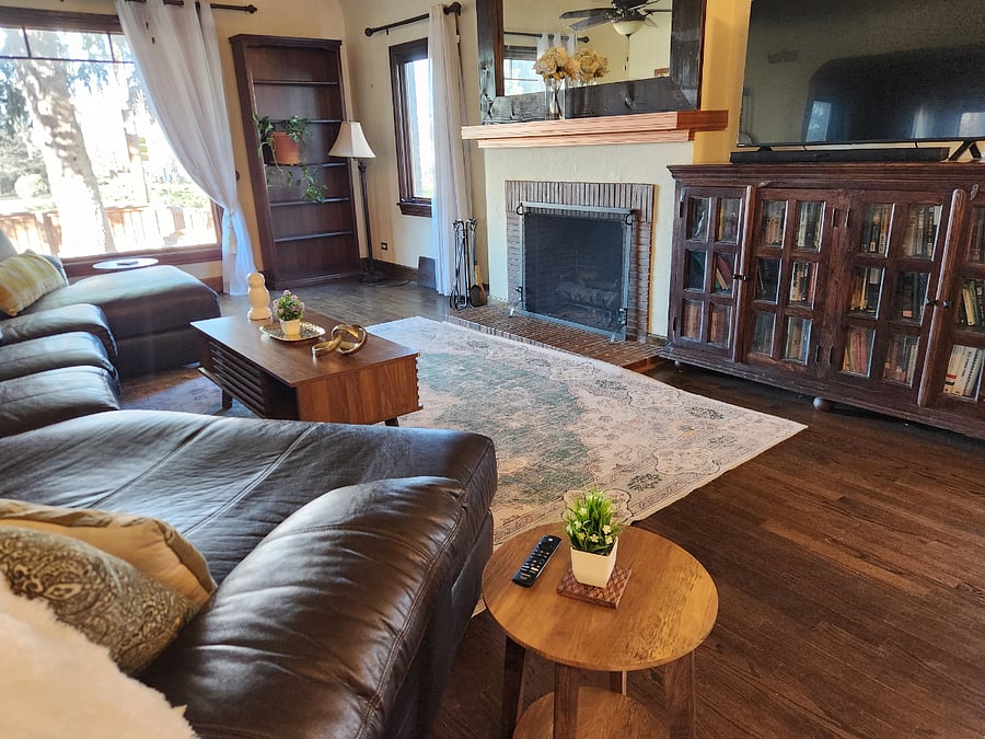 Main living room stocked with books!