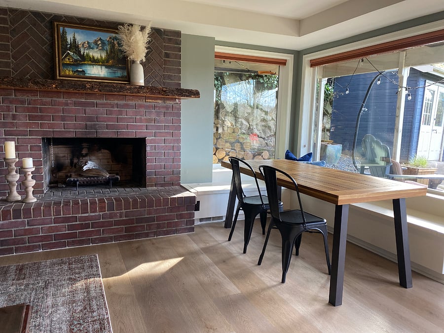 Dining table with views of the backyard is great for meals, games or working remote.