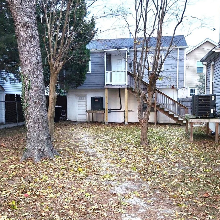 The backyard is entirely fenced in.  This space is shared with other tenants on the property.