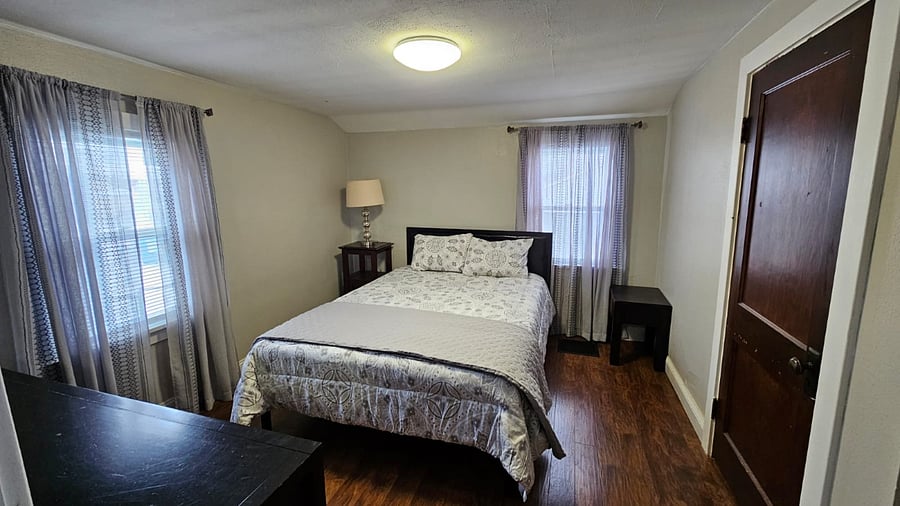 Master bedroom with 2 closets: small reach-in closet plus a huge walk-in closet