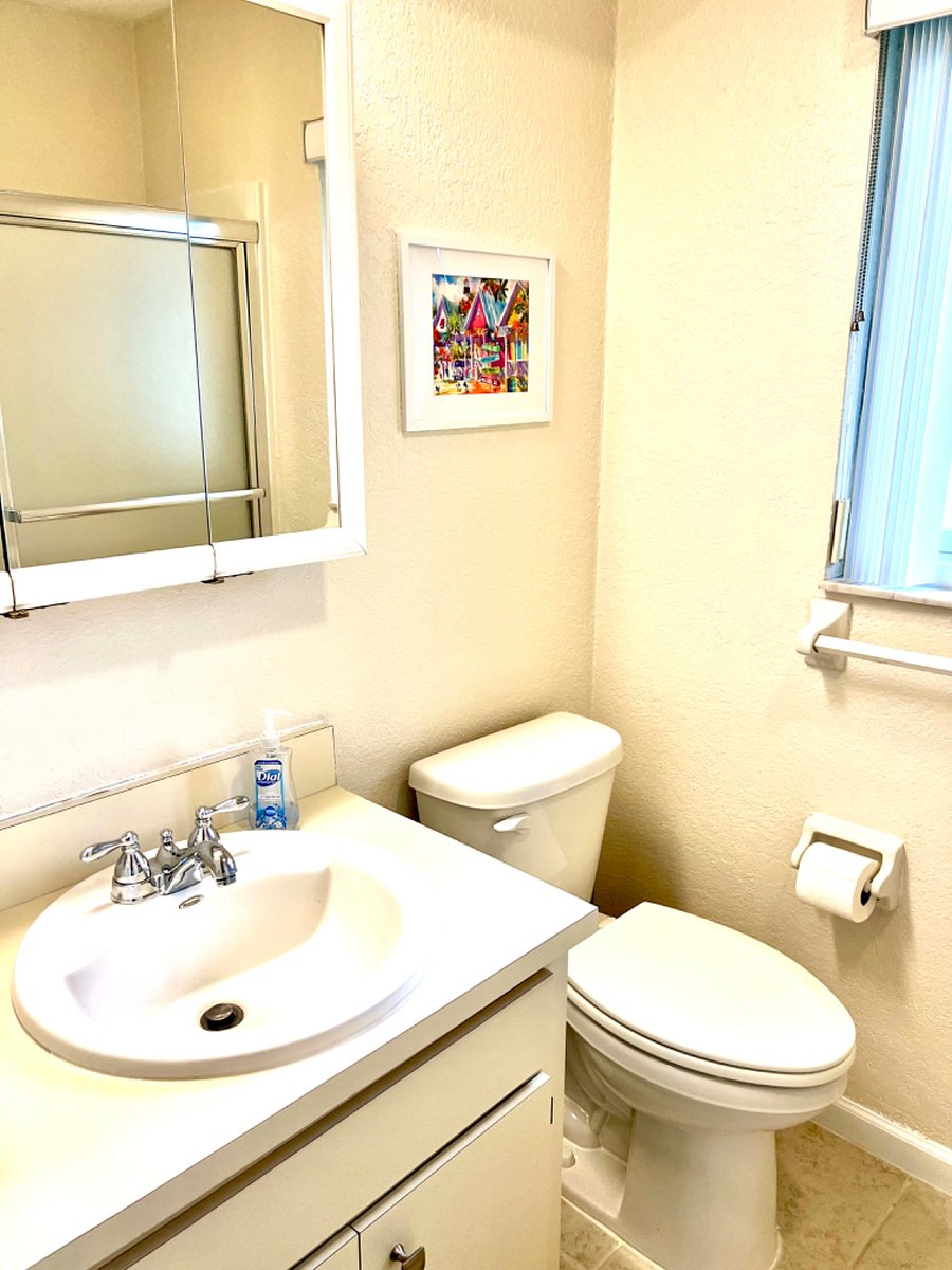 Both bathrroms have toilet, sink, and tub/shower.