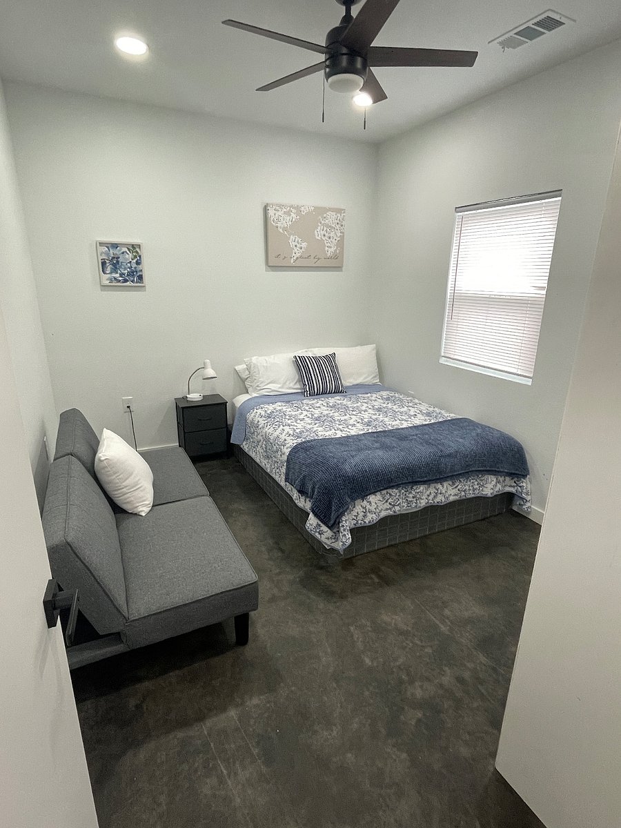 The bedroom 2 includes a comfortable futonperfect for lounging, reading, or accommodating an extra guest. It easily folds out into a bed for added flexibility during your stay.