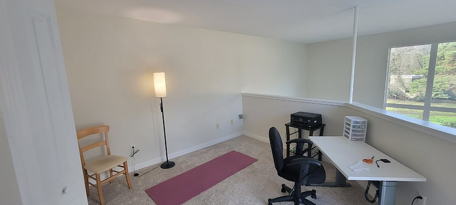 Lots of room in the loft for online yoga,  includes an adjustable table and 