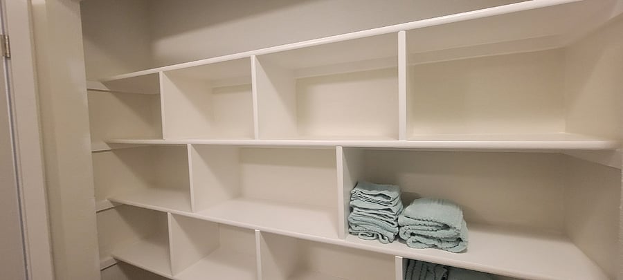Organizer closet in the upstairs bathroom