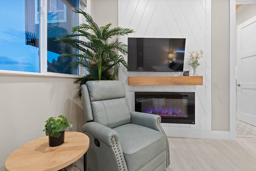 Suite One, Beach room fireplace, rocker, swivel, recliner.