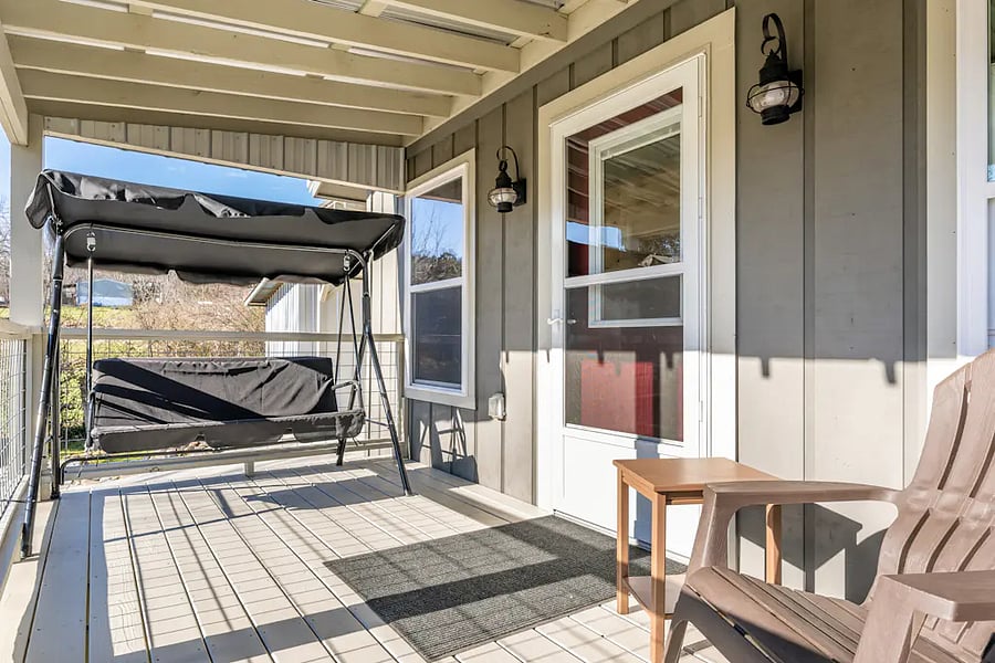 Swing and additional seating on the back covered deck
