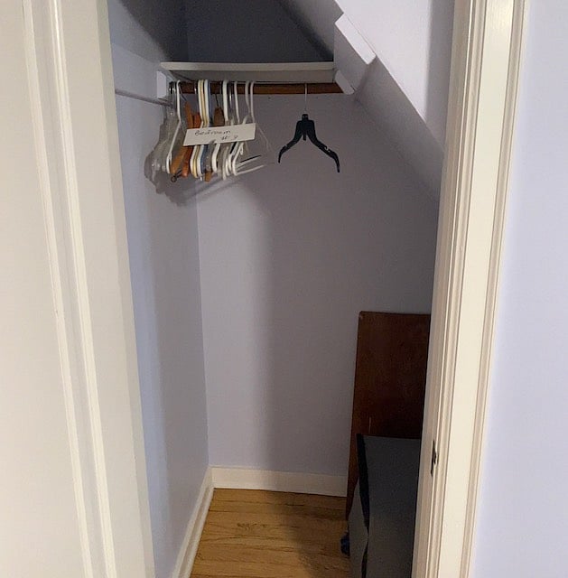 Bedroom three closet with hangers