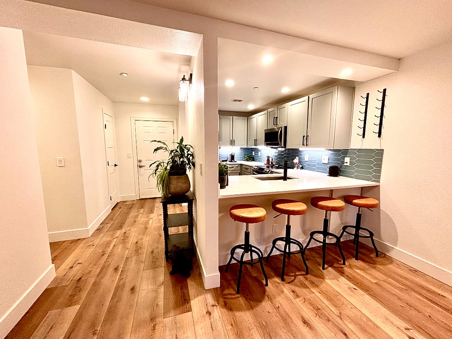 Gentle lighting highlights the smooth walls and clean lines, making the space feel open and serene.