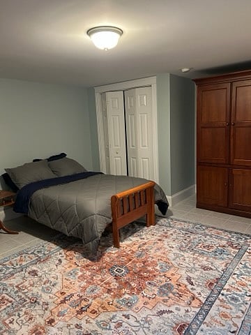 Bedroom with double bed and new mattress and bedding.