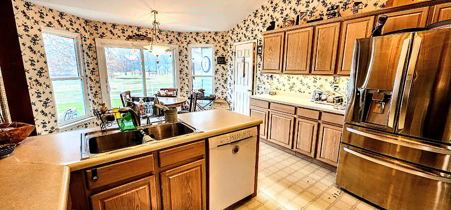 View from corner of kitchen by stove.