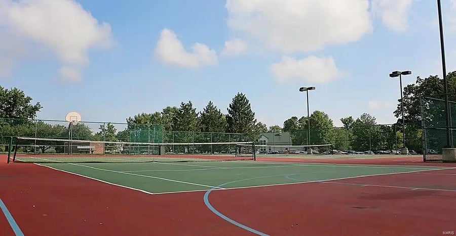 Our tennis/pickleball court view from gate to pool. Main entrance off our private parking lot.