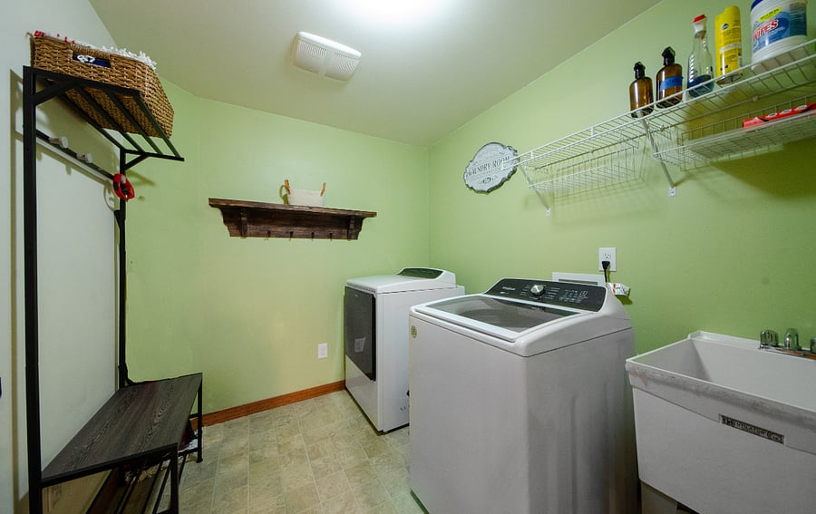 Laundry room with washer/dryer and laundry sink