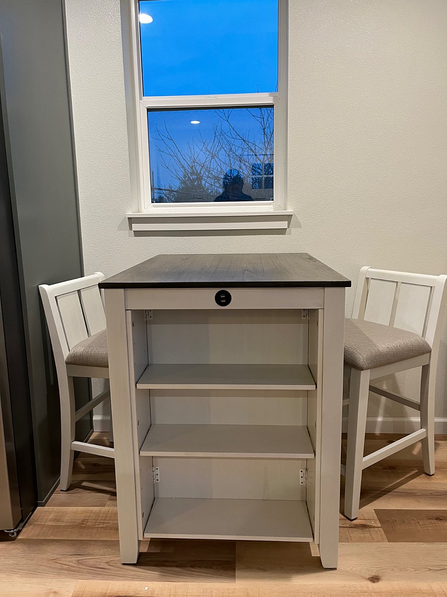 Dedicated table for eating-in or working from home. Has USB charging ports built in to table.