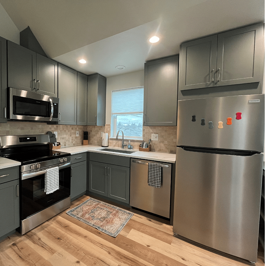 Full size dishwasher and refrigerator. Lots of storage.