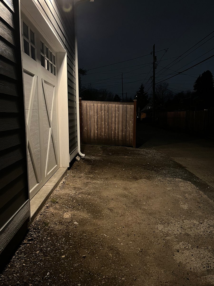 The designated parking area for one vehicle and is well lit. We do not use the garage for parking so your vehicle has lots of room. For safety, automated lighting from dusk to dawn.