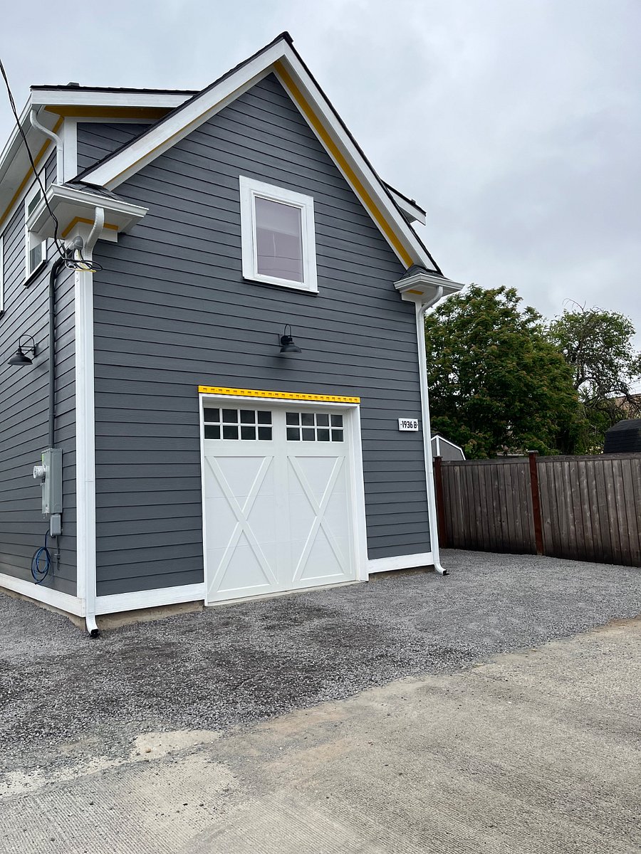 Outdoor parking spot for one vehicle included. The garage is part of the main house use but no cars are kept in it.