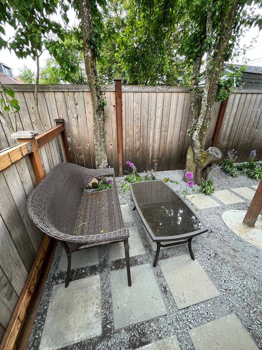 Beyond the parking area is a main floor dedicated outdoor space for your personal use.