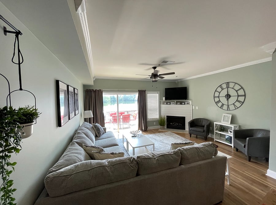 First Floor Living Room with fireplace and balcony