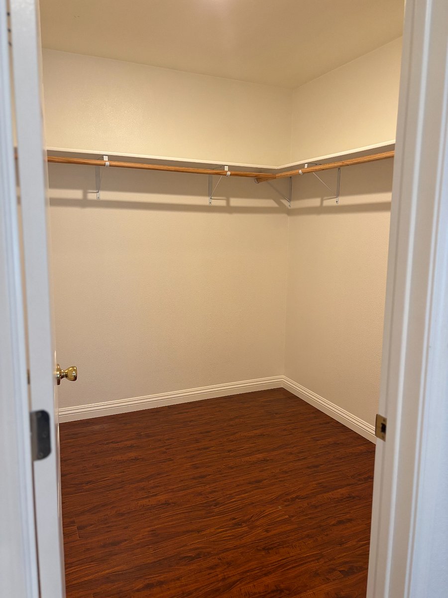 Spacious walk-in closet in the primary bedroom