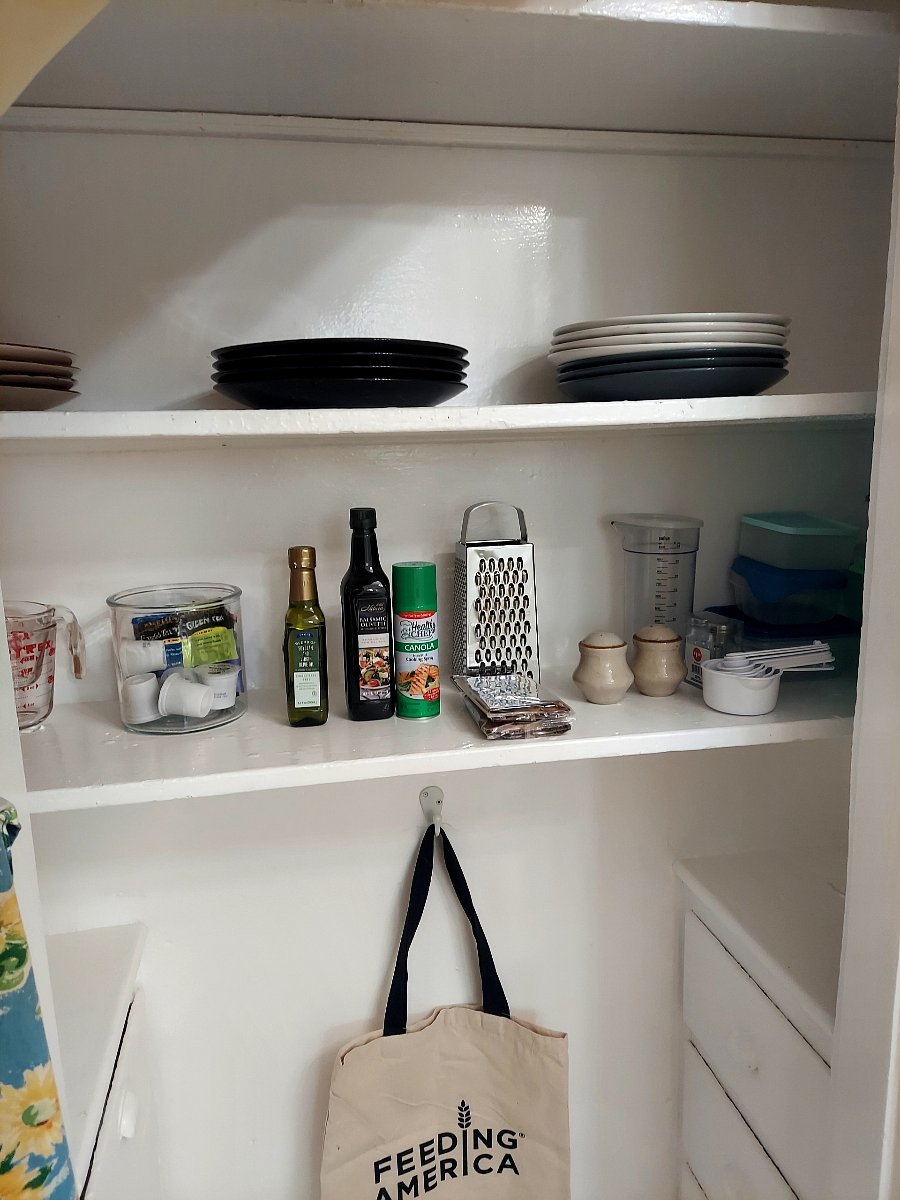 Kitchen pantry behind curtain