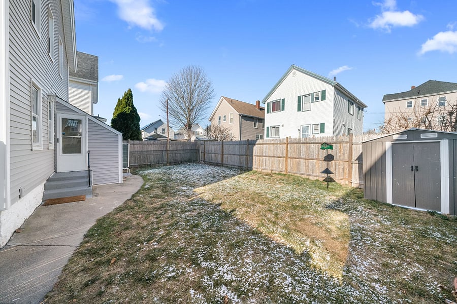 Small backyard has some seating in the spring/summer, great for relaxing.