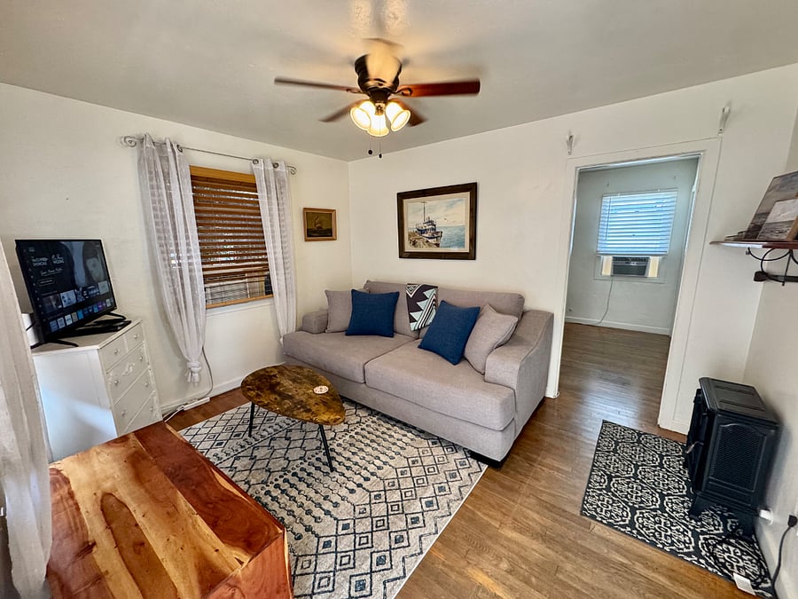 UNIT ONE. Living Room 4081- 1bed/ 1bath private cottage with semi-private gated yard.