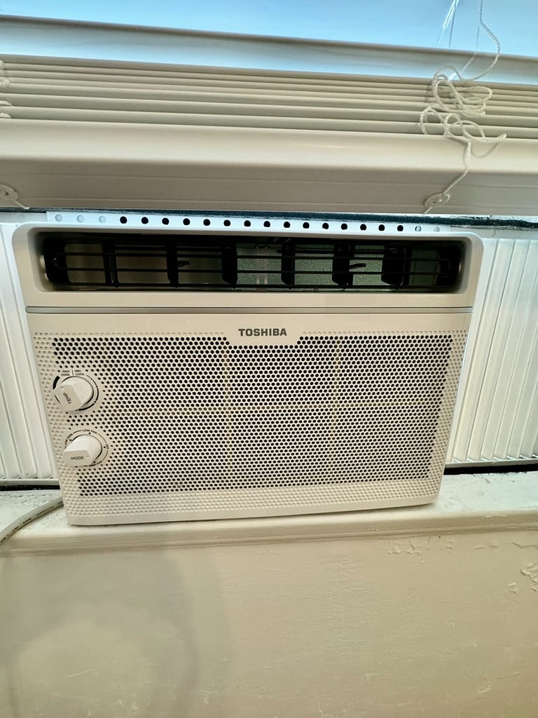 Two window A/C units. Bedroom and living room